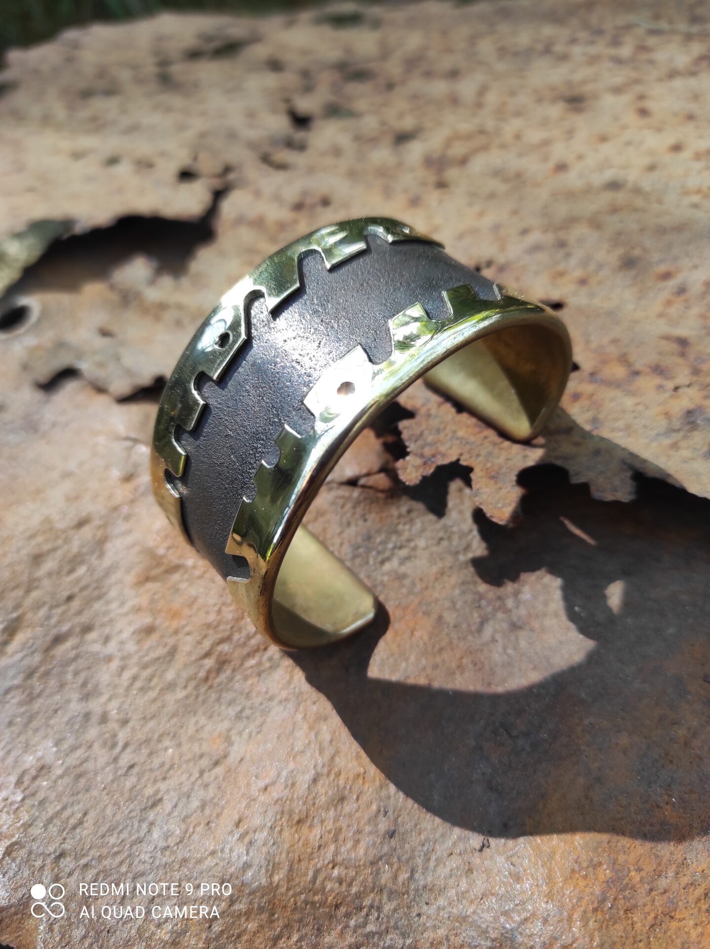 Brass and patinated steel cuff